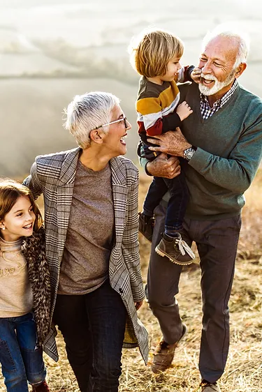 New Patient Offer Smiling seniors with grand-children
