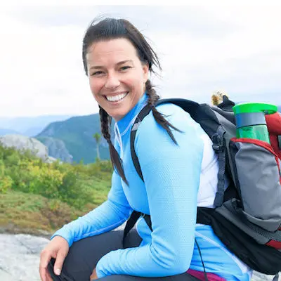 woman outdoors smiling