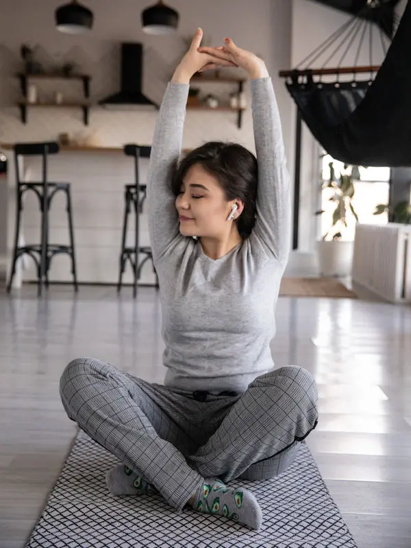 Woman stretching on a yoga mat